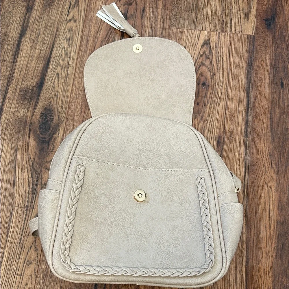 Like new Boho Chic Beige Backpack with Braided Accents